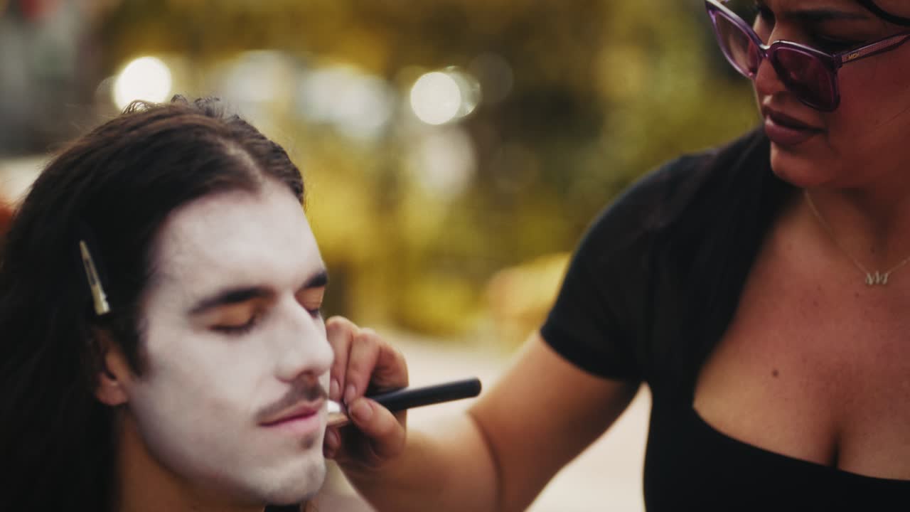 Makeup Artist Applying Face Paint