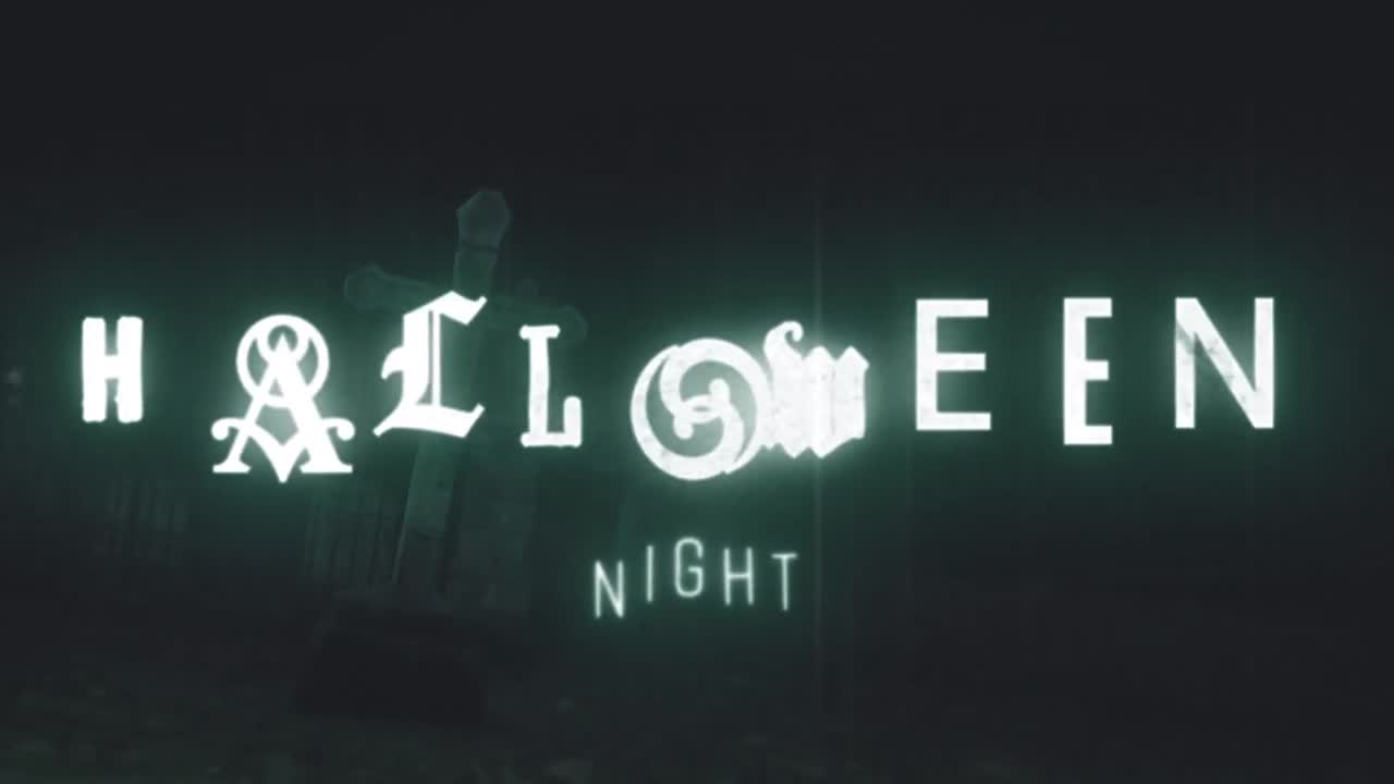 animación de la noche de halloween sobre el cementerio y la linterna por la noche