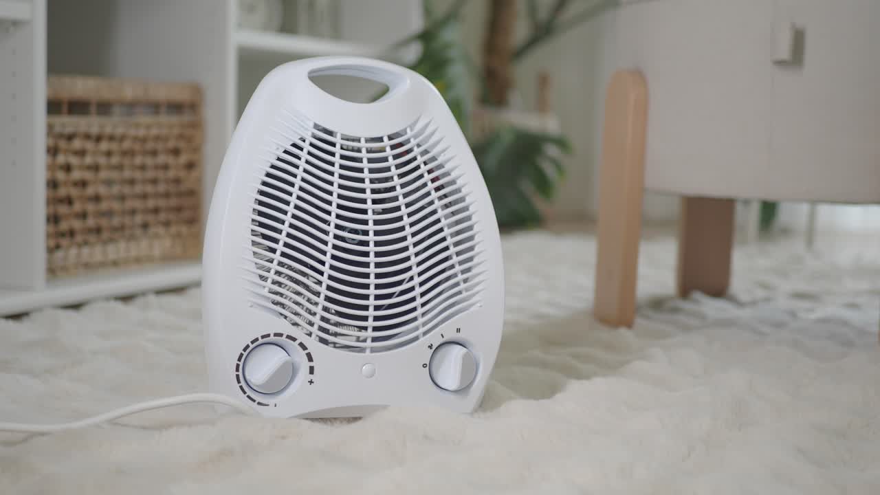 White Portable Heater on Fluffy Rug