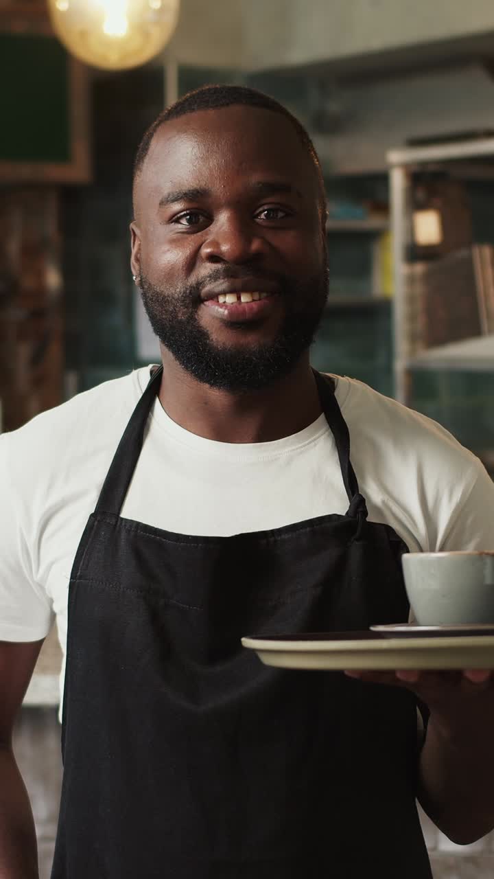 Smiling Waiter Serving Coffee
