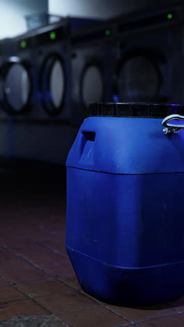 blue barrel in a laundry room