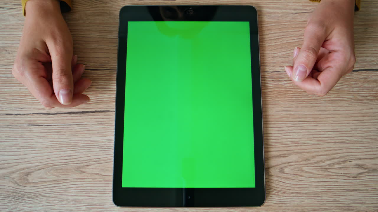 Lady hands surfing green screen tablet internet at office closeup. Unknown woman