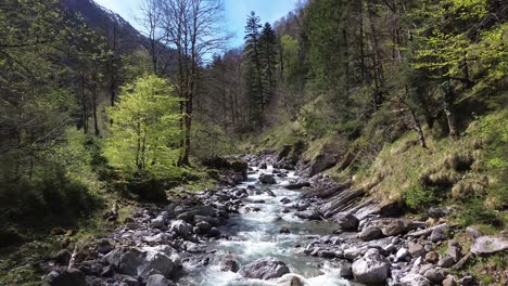 Drone-rise-up-Mountain-Valley-with-Idyllic-River-with-Crystal-Clear-Turquoise-Water-in-Europe,-Austria