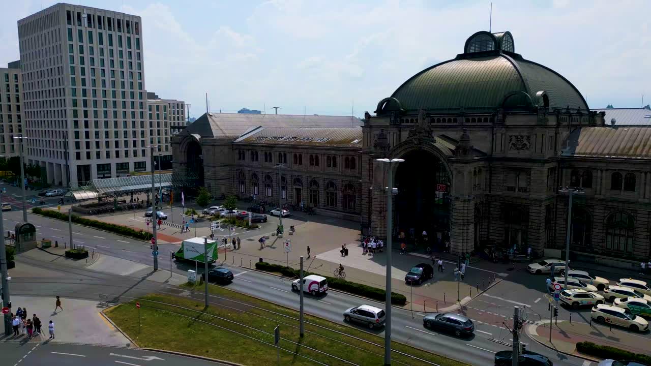 4K Aerial Drone Video of Auto Traffic in front of the Hauptbahnhof Train Station in Downtown Nurnberg, Germany