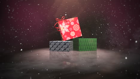 primer plano animado cajas de regalo de navidad sobre fondo de nieve y brillo 1