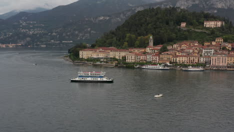 aerial of beautiful old city at the edge of lake como, italy