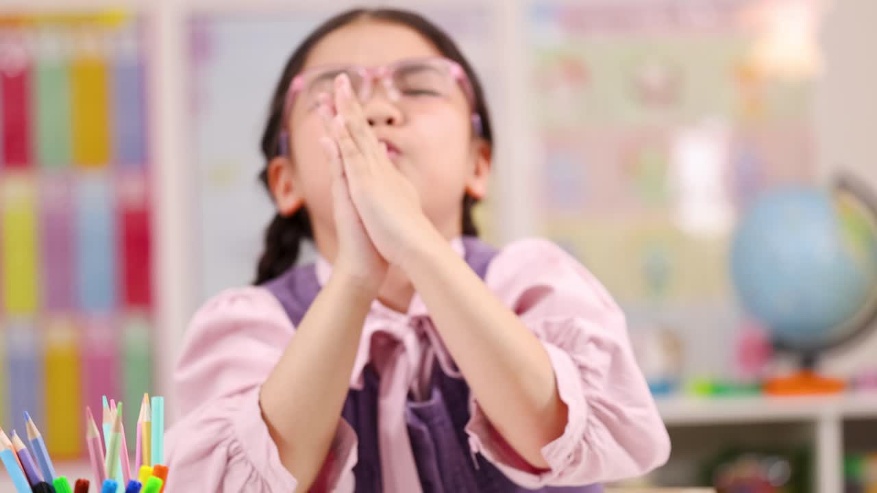Girl with Glasses in Classroom