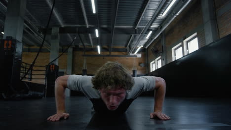 exhausted fighter sweating in fitness center