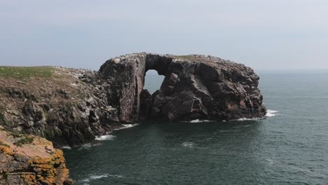 medium shot of bullers cliffs looking to dunbuy arch