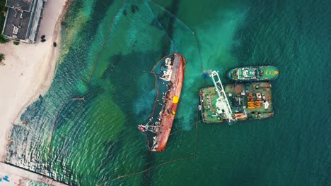 oil spill cleanup operation at sea