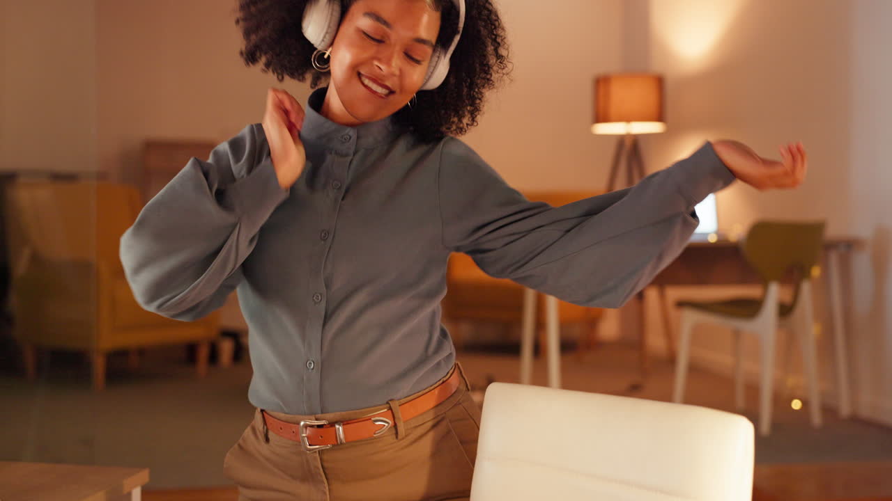 Happy woman, headphones and dancing in office