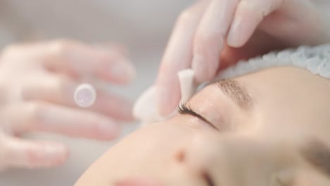 cosmetologist performing facial injection procedure