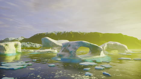 colorful ice formations on a calm ocean with a mountainous background