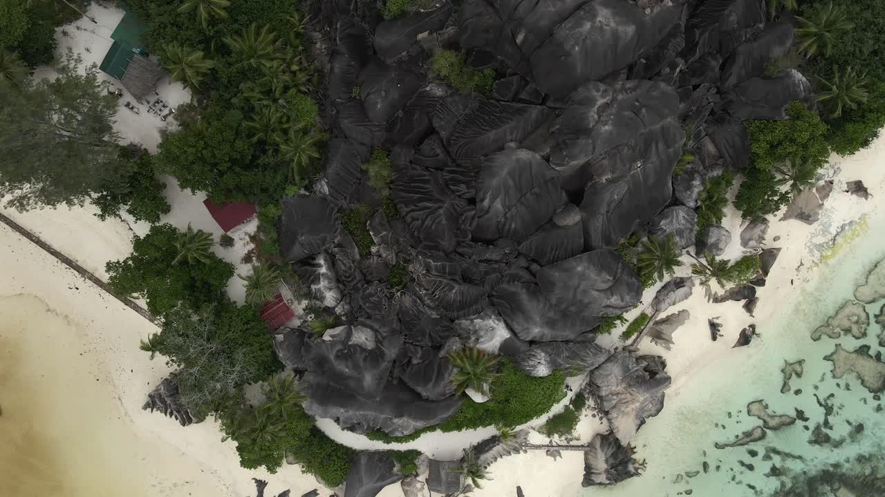 Anse Source d'Argent beach on island La Digue in Seychelles filmed from above