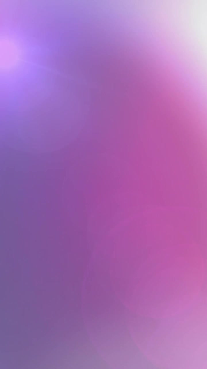 Animação de luzes brilhantes e pontos sobre fundo roxo.