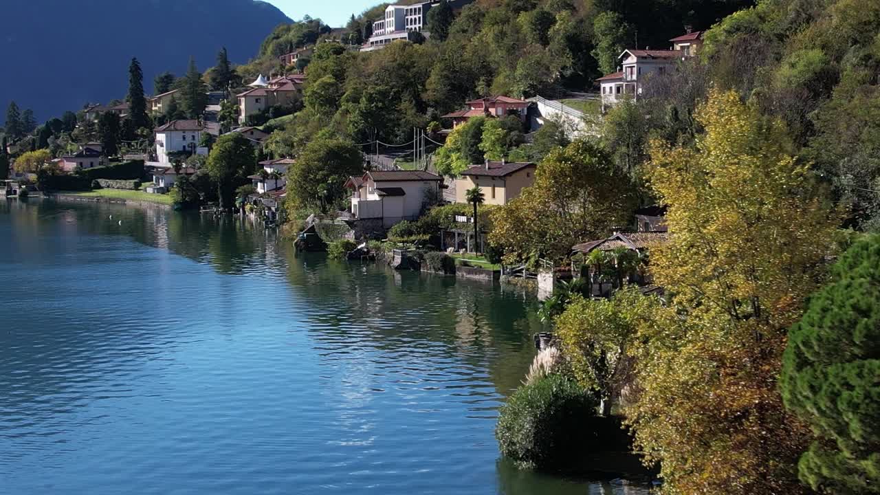 Stunning aerial view of lakeside homes in the Italian Alps