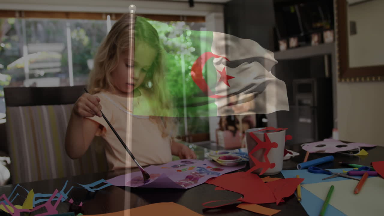 Crafting at table, child creating art with Algerian flag animation in school