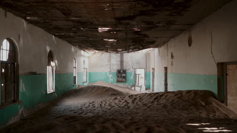 abandoned building filled with sand