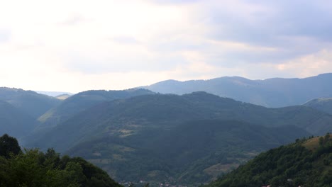 beautiful scenery of green mountain range under cloudy sky