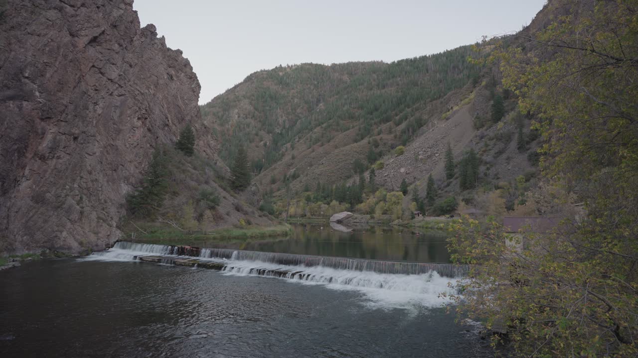 Scenic Mountain Landscape with River and Dam