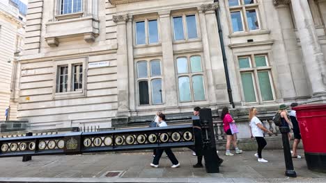 pedestrians walking by a closed road