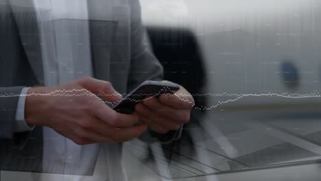animation of data processing over caucasian businessman using smartphone