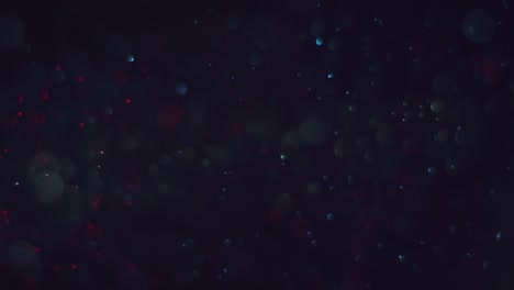 partículas voladoras brillantes de colores