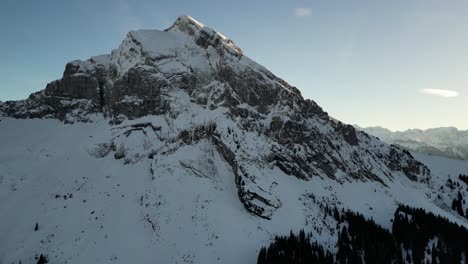 Fronalpstock-Switzerland-Glarus-side-flight-of-Swiss-alps-with-sunny-background