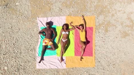 diverse couple chilling on floats