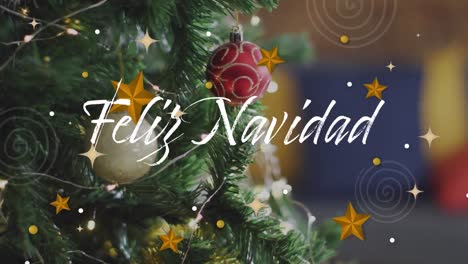 animación de las estaciones de navidad saludos en español sobre adornos de bolas en el árbol de navidad