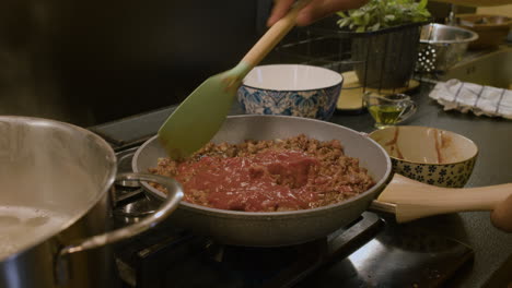 person cooking in the kitchen