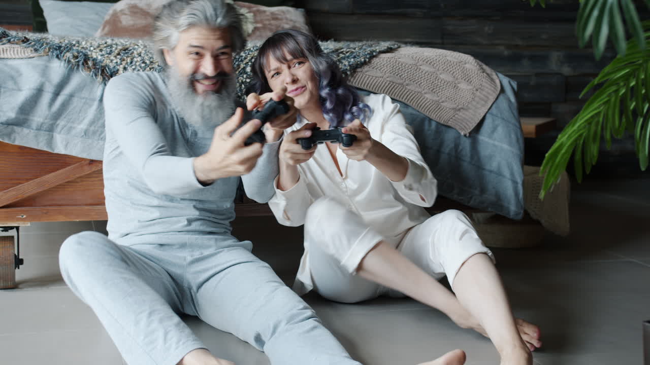 Couple Playing Video Games at Home