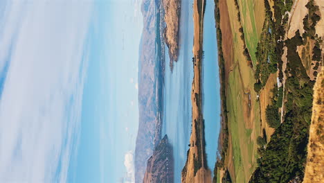 overlooking lake wanaka new zealand's vast wilderness landscape - vertical time lapse