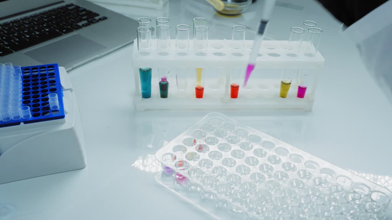 Laboratory Experiment with Test Tubes and Microplates