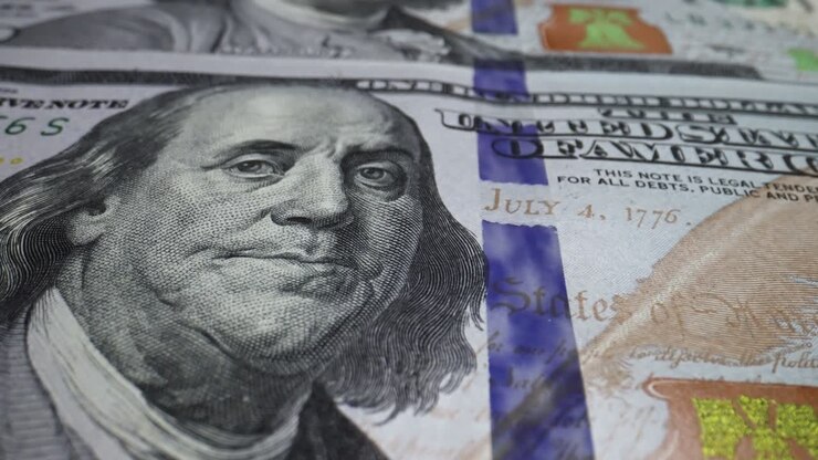 Macrofotografia di banconote da cento dollari. Denaro contante.