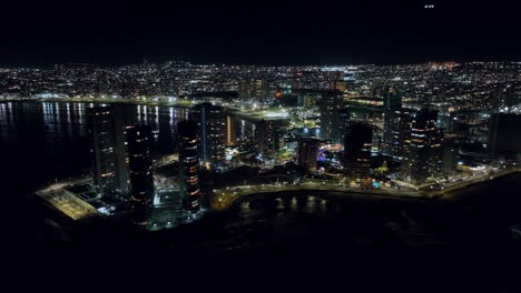 Aerial-shot-of-the-seafront-skyscrapers-in-Iquique,-Chile