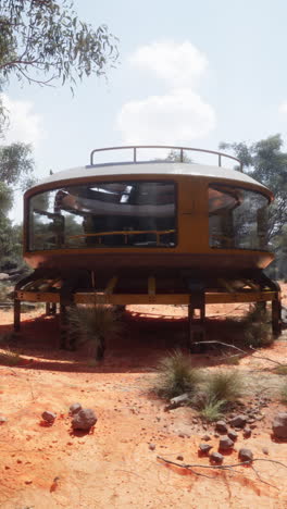 futuristic flying saucer in a desert landscape