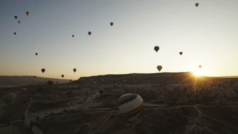 hot air balloons over cappadocia at sunrise