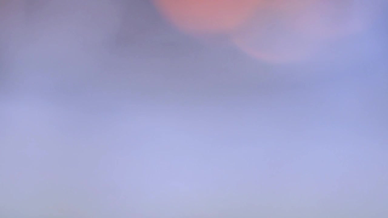 Abstract Background with Soft Glowing Bokeh Light Orbs