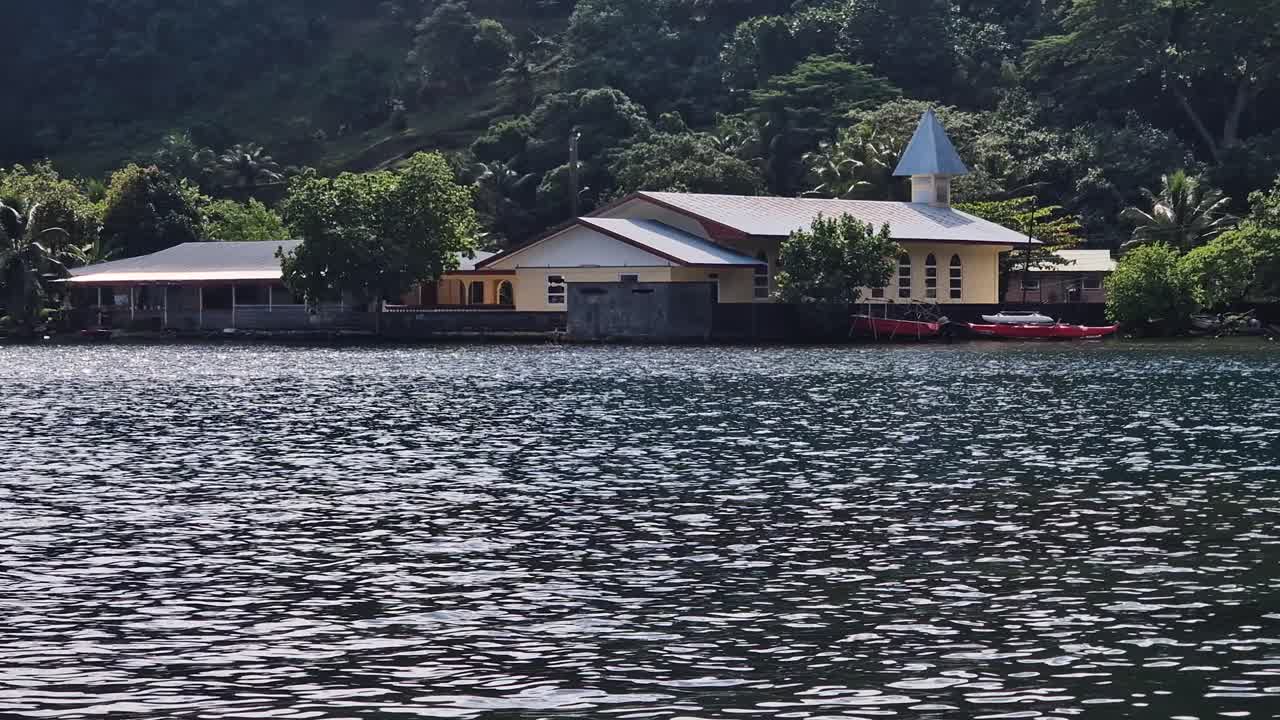 A picturesque church by the water surrounded by nature