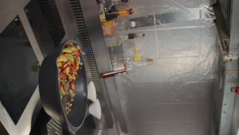 frying vegetables on fire