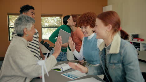 diverse group of students celebrating success with high fives and teamwork