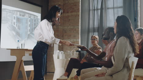 Asian-Woman-Thanking-Audience-after-Architectural-Presentation