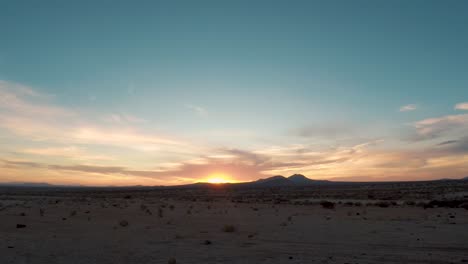 Colorful-sunrise-timelapse-in-California-Mojave-Desert,-zoom-out