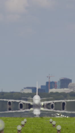 airplane landing at airport with reflection