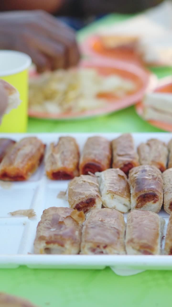 Outdoor Gathering with Appetizers and Pastries