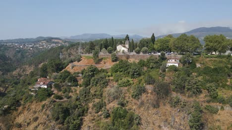 aerial approach of são dinis cemetery curch, vila real city, portugal