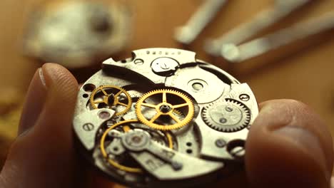 mechanical watch repair process, close up