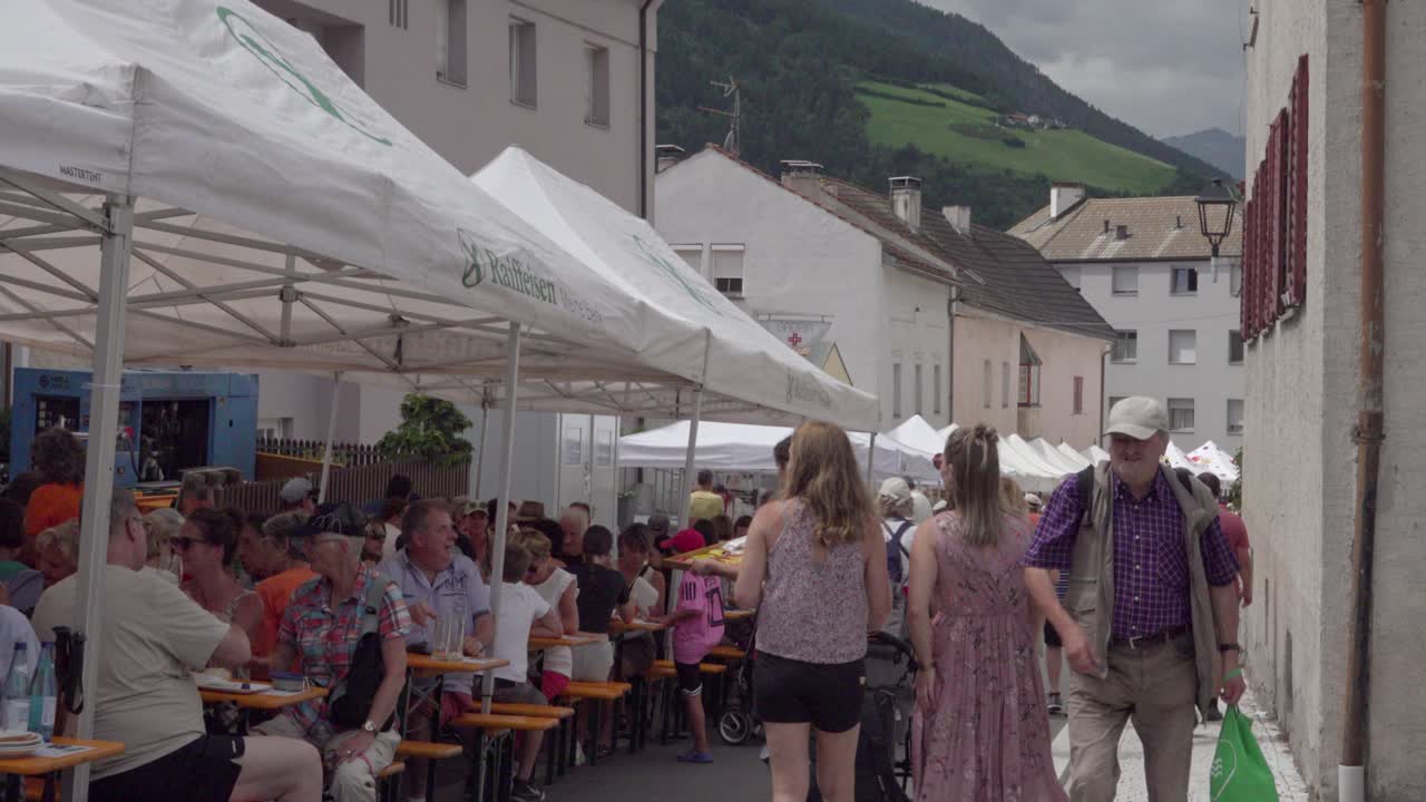 Marble and Apricot Festival - visitors and stands on the main street, Laas - Lasa, South Tyrol, Italy (part 2 of 2)