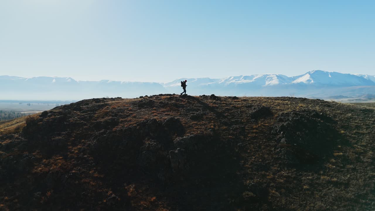 Hiker on a Mountain Ridge